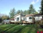 Southern Exposed back yard with large sundeck and 6-8 person hot-tub.
